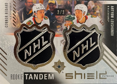 2025-26 Upper Deck Ultimate Collection Hockey Rookie Tandem Shield Patches Connor Bedard, Artyom Levshunov 2025-26 Upper Deck Ultimate Collection Hockey Rookie Tandem Shield Patches Connor Bedard, Artyom Levshunov